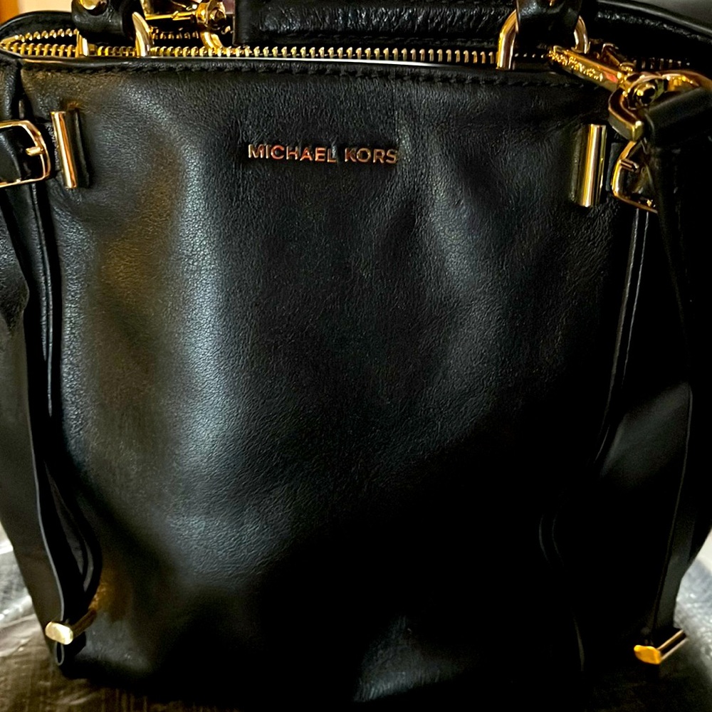 Black Michael kors little hand bag